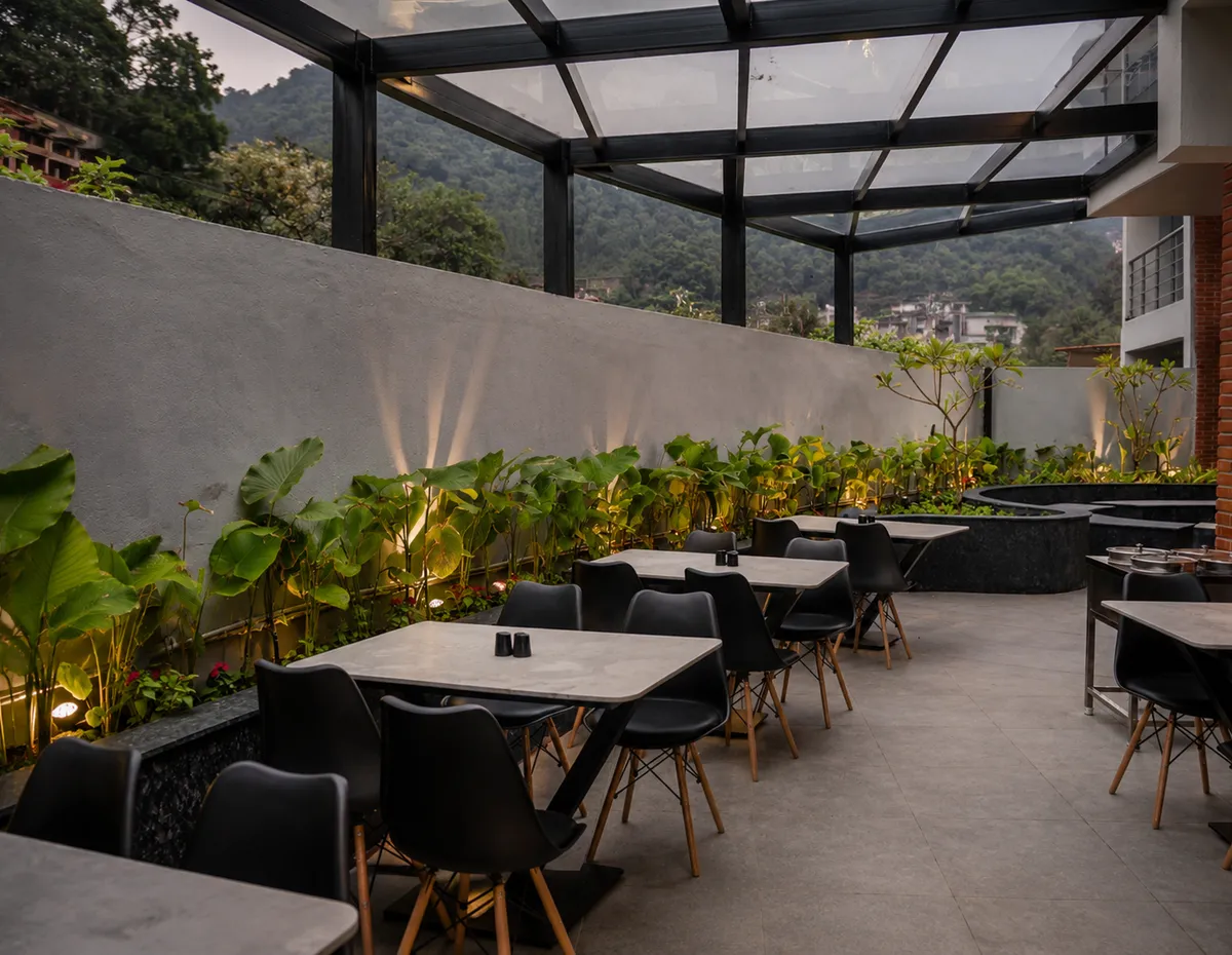 The glass-roofed terrace dining room at The Lovedale in the morning light